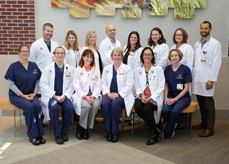 Group of pediatric hospitalists in white coats at Riley Hospital for Children