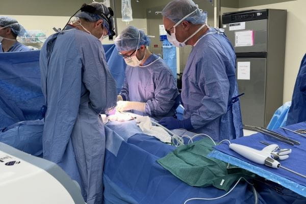 Sartino operating alongside father-in-law, C. Max Schmidt, MD, PhD, MBA