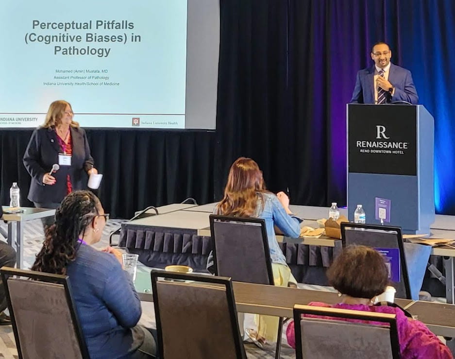 Mohammad Mustafa at a podium