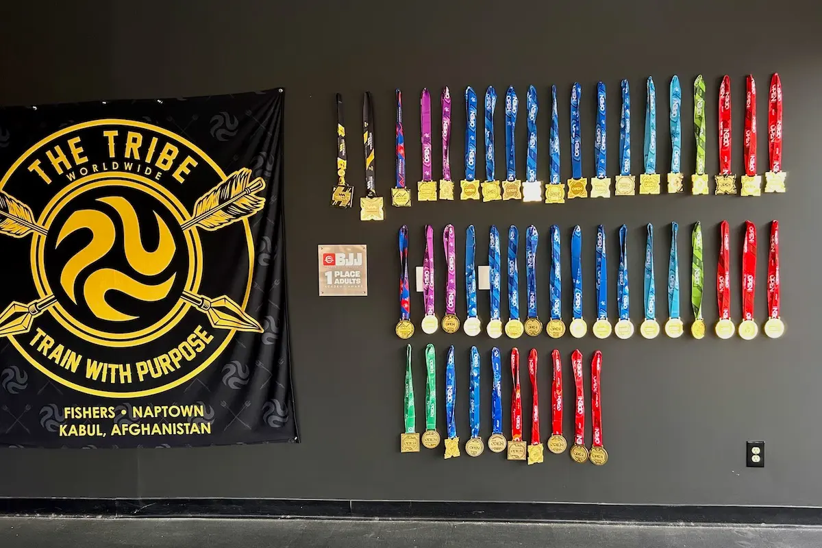 Dozens of Conboy's medals hang on the wall at Naptown Brazilian Jiu-Jitsu