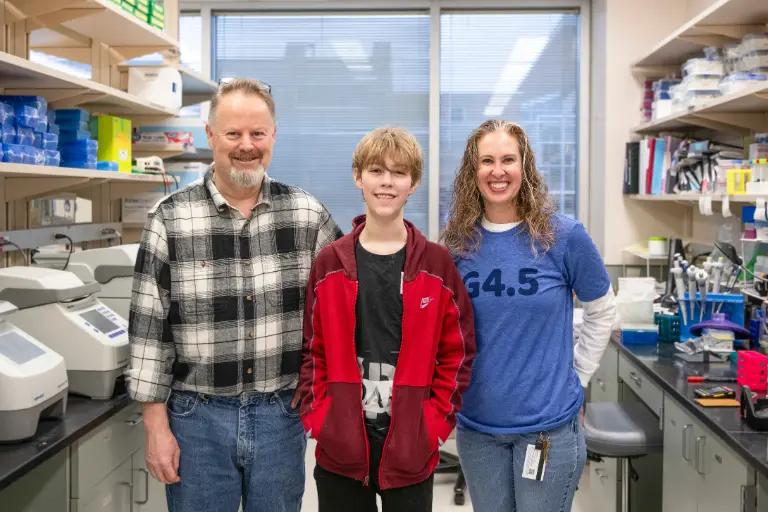 Simon Conway, PhD, Henry and Paige Snider, PhD at the Conway lab 