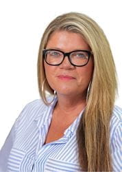 Courtney Cowley, woman with long hair and glasses in striped blouse