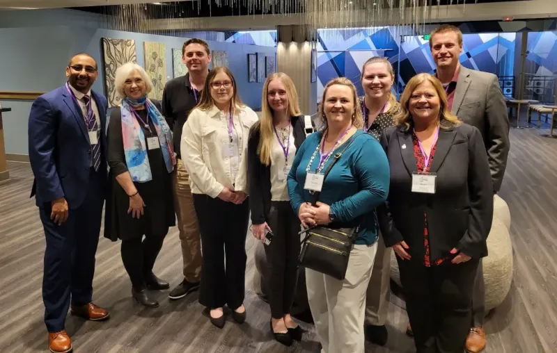 From left to right: Amin Mustafa, Program Director Barbara McGahey Frain, Michael Vujnovich, Jayla Miller, Megan Kersey, Liz Purcell, Taylor Curry, IU alum and past president of ASCT Margee Muciarelli, Education Coordinator and current ASCT President Josh Howell. cytology students posing for camera