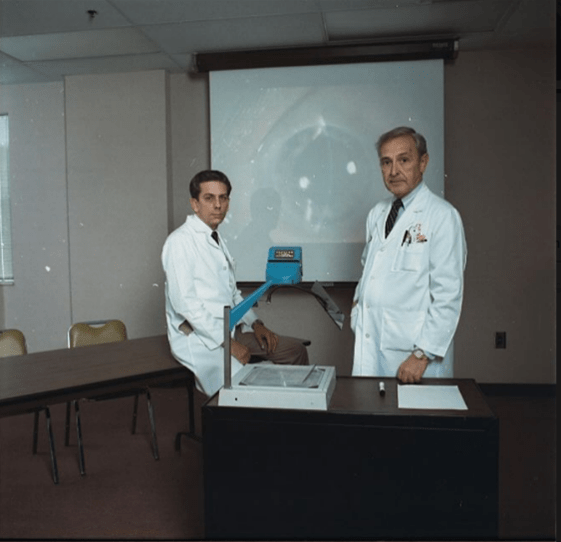 Forrest “Daryel” Ellis, MD (right) and Martyn Wills, MD (left), Indiana University School of Medicine Department of Pediatric Ophthalmology, 1989.