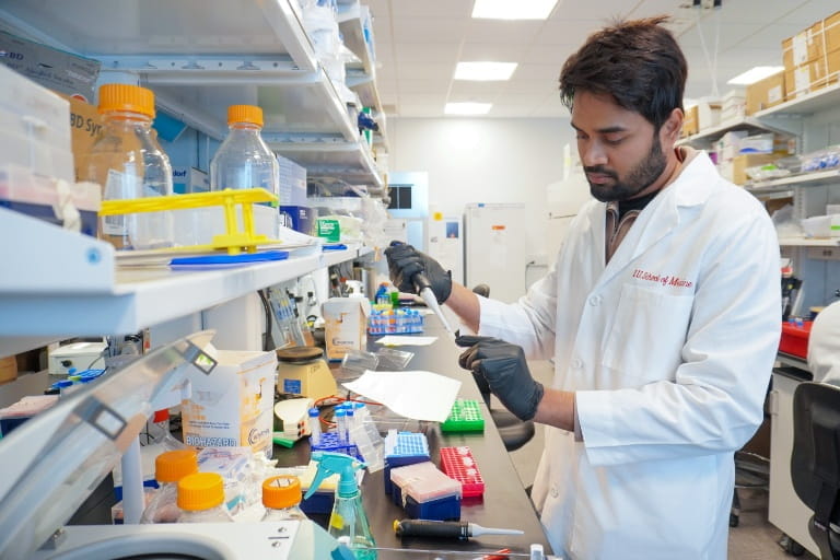 Evans-Molina lab member Prudhvi Terli working in the lab