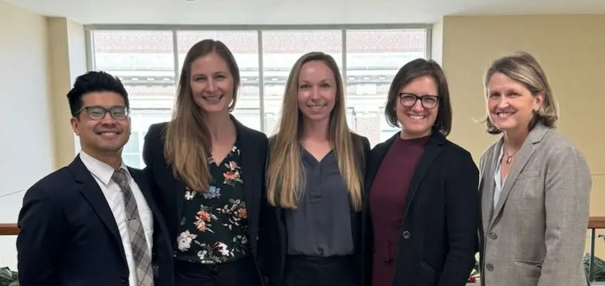 Lisa Landrum stands with four other members of IU's gynecologic oncology team.