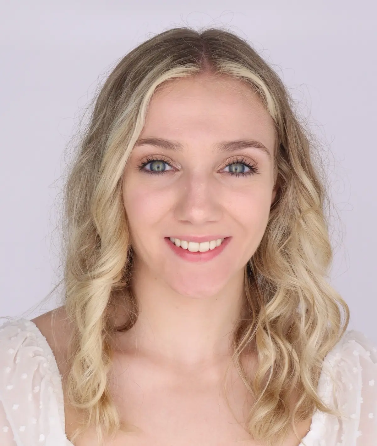 headshot of Jade McIntyre, woman with light skin and blonde hair