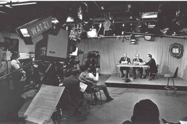 black and white photo showing the filming of a medical news conference on Dec. 18, 1973.