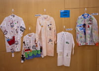 Photo of people at decorated lab coats