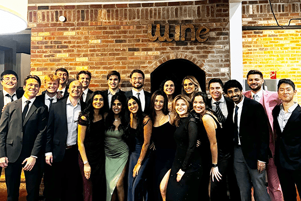 Several MS1 students from the Fort Wayne campus take a photo while attending the St. Vitus dance on January 18, 2025.