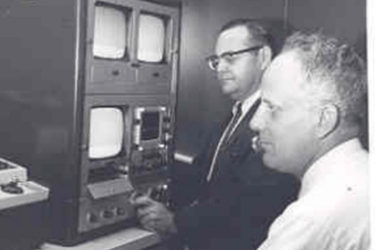 Seymour Freidberg adjusts the wave form monitor while Ralph Nye makes a video recording