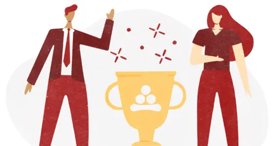 stock image photo of a man and woman standing around a trophy that has sparkles coming out of it 