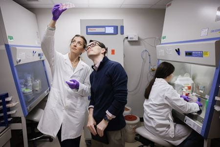 Richard L. Carpenter works with student Haddie DeHart in his lab at IU Bloomington on Friday, Feb. 13, 2026. | Photo by James Brosher,Indiana University A man and woman review a lab specimen.