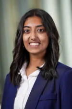 Ananya Tadikonda | IU School of Medicine Person in professional attire in front of blurred office lobby background