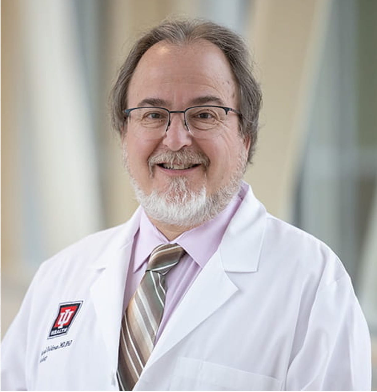 Michael Feldman headshot in white coat