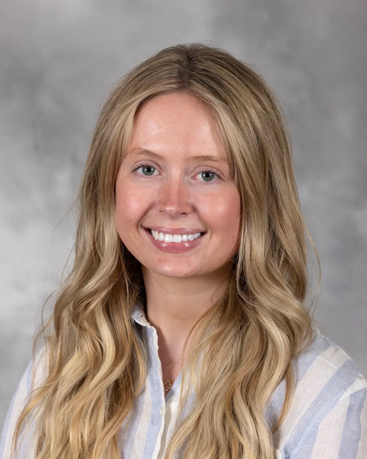 Headshot of Elsie Walters, white woman with long blonde hair