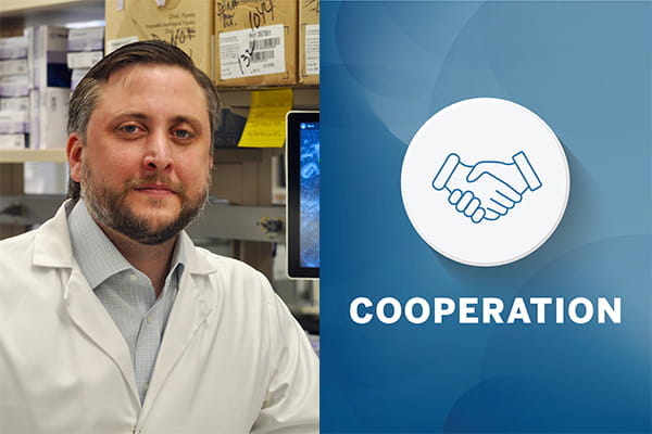 Michael Davis with Cooperation badge