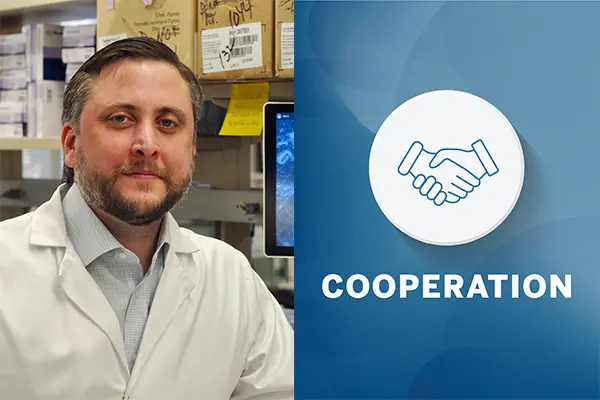 Michael Davis with Cooperation badge