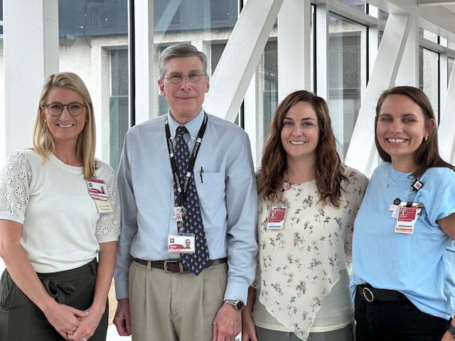 Dr. Hicks with his current fellows Photo by Shannon, Division of Child Protection Thompson