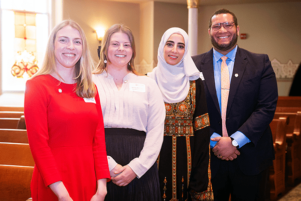From left: Zoe Guckien, MD, Emily Matney, MD, Daeya Jouma Al Hadid, MD, and Stephen Watty, MD, pose after being inducted in as resident physicians into the Gold Humanism Honor Society on Oct. 13.
