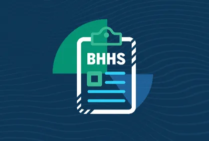 A clipboard with BHHS written on it