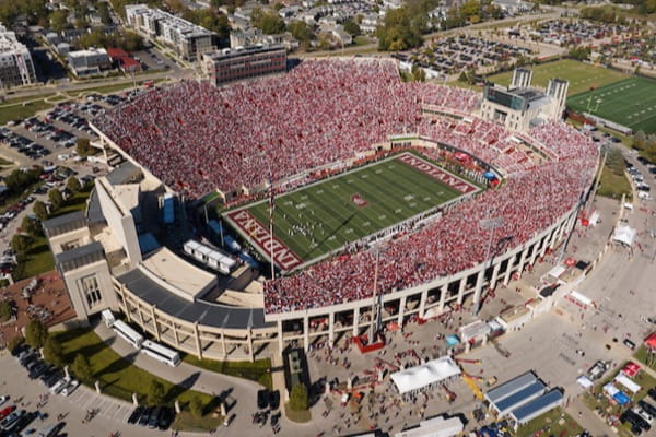 Aerial view of memorial stadium filled with fans in red