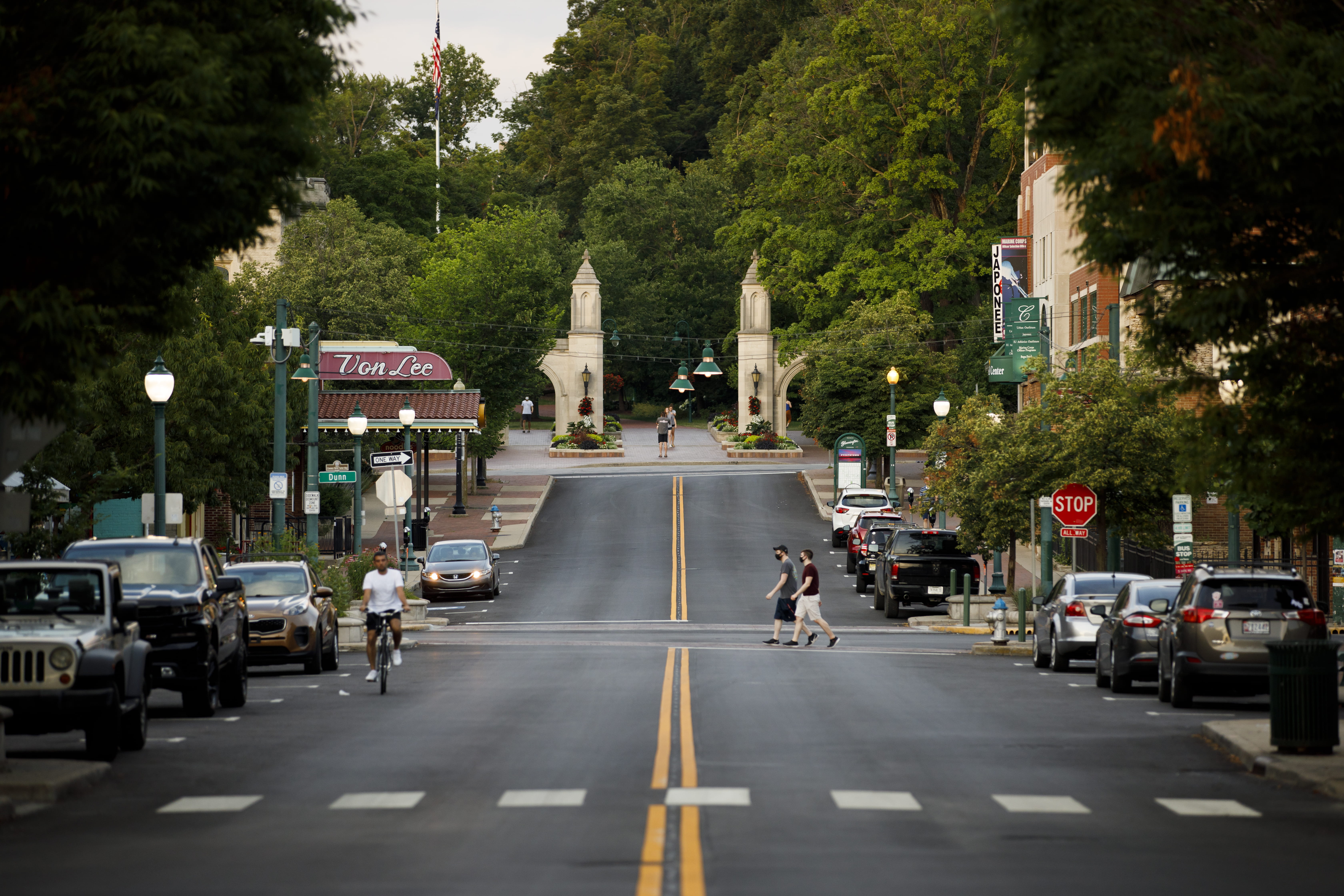 The Sample Gates are pictured from Kirkwood Avenue on a summer evening at IU Bloomington