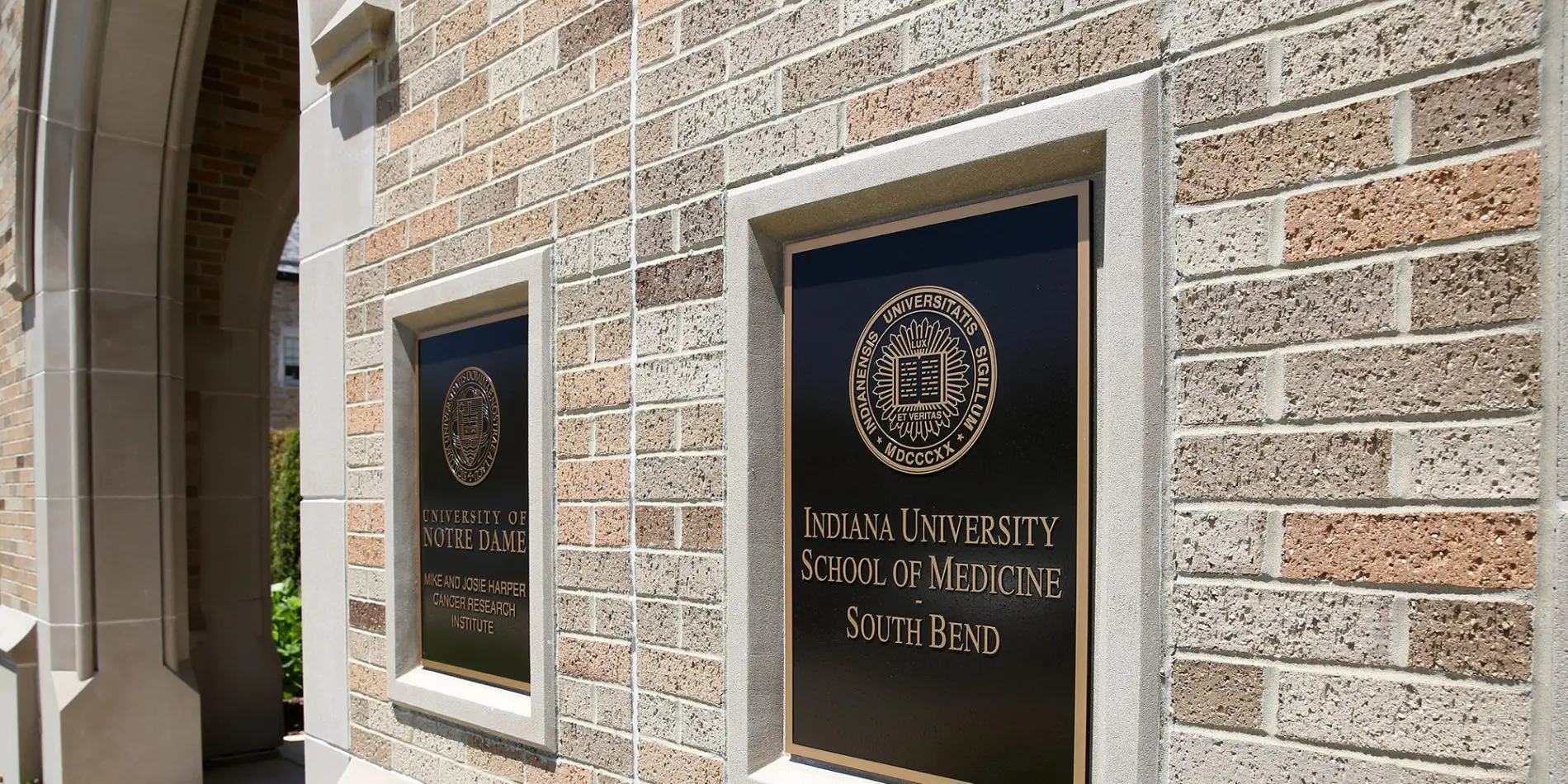 Exterior of building on the south bend campus with IU School of Medicine sign on the wall
