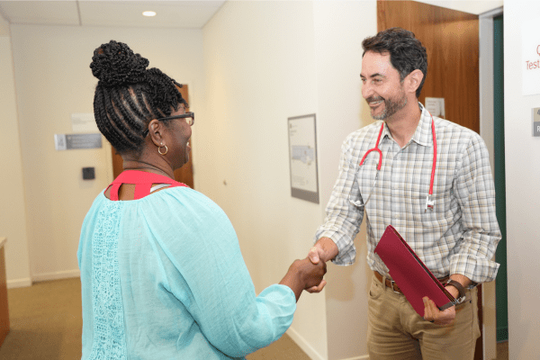 Jared Brosch, MD greets a participant