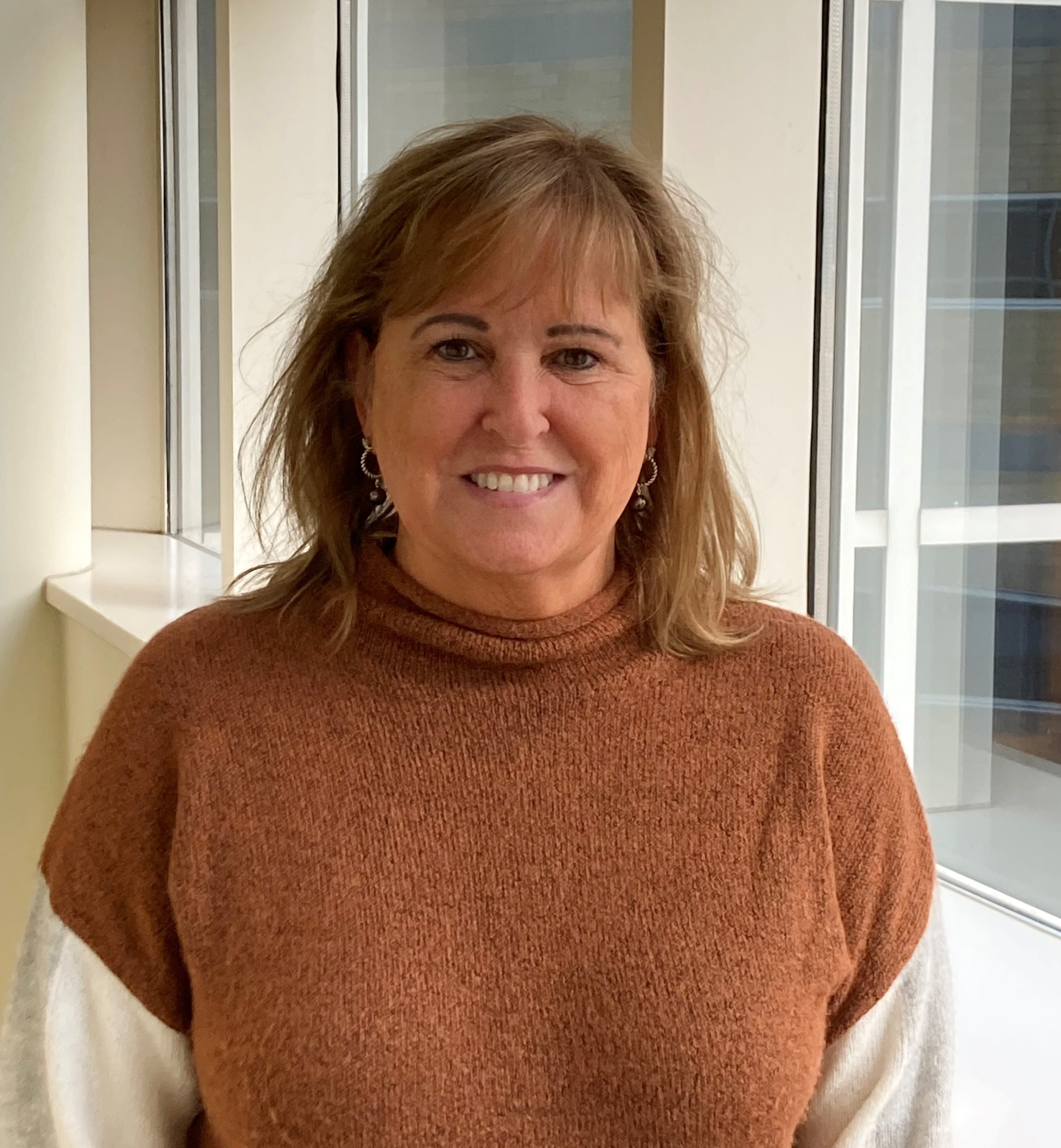 Staff photo of Julie Seybert in a square shape. 