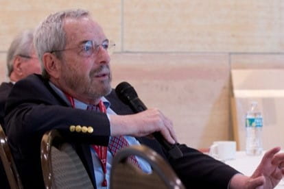 robert kloner holds the microphone and asks a question