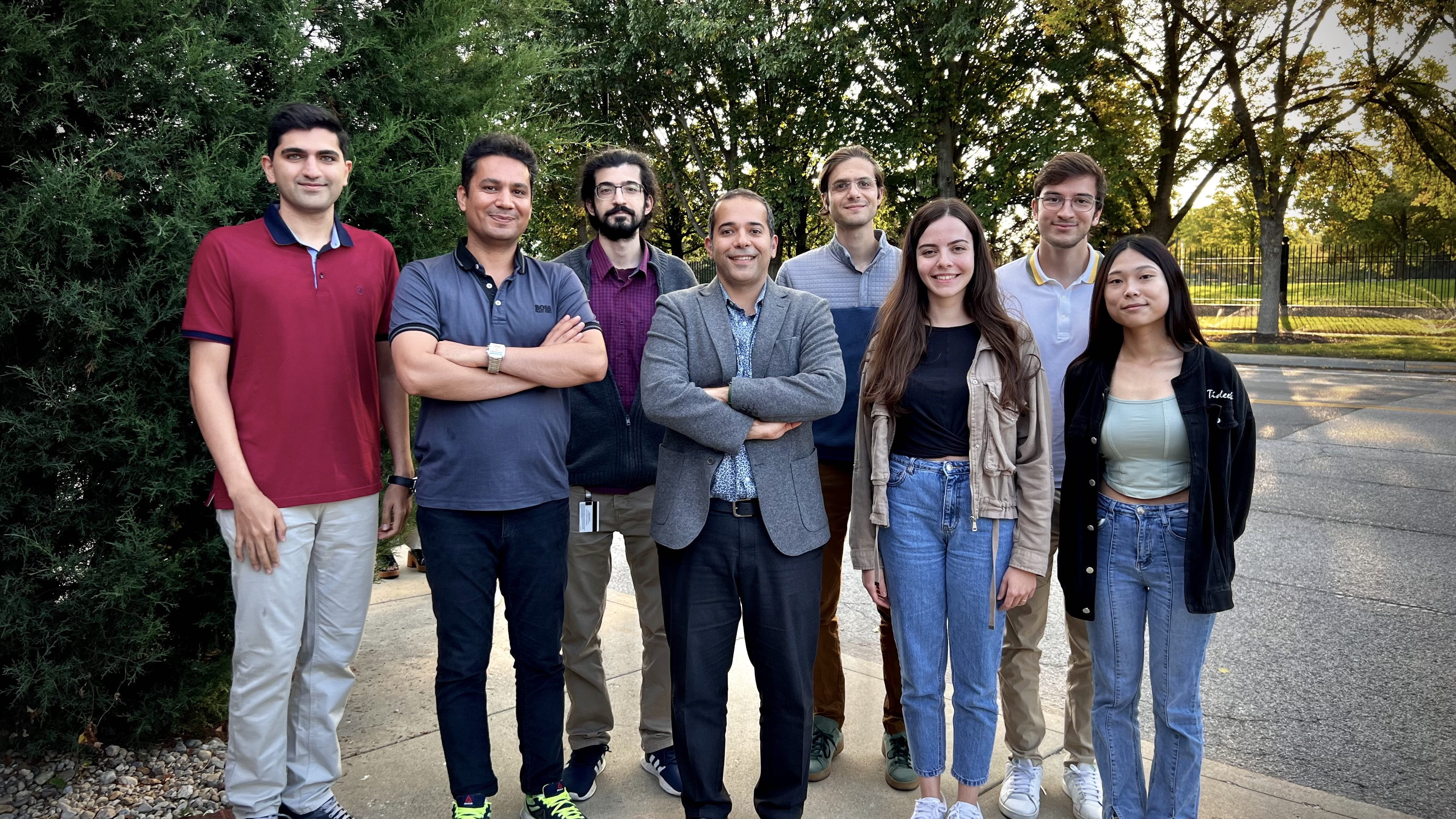 group photo of cardiovascular researchers outside on a sunny day