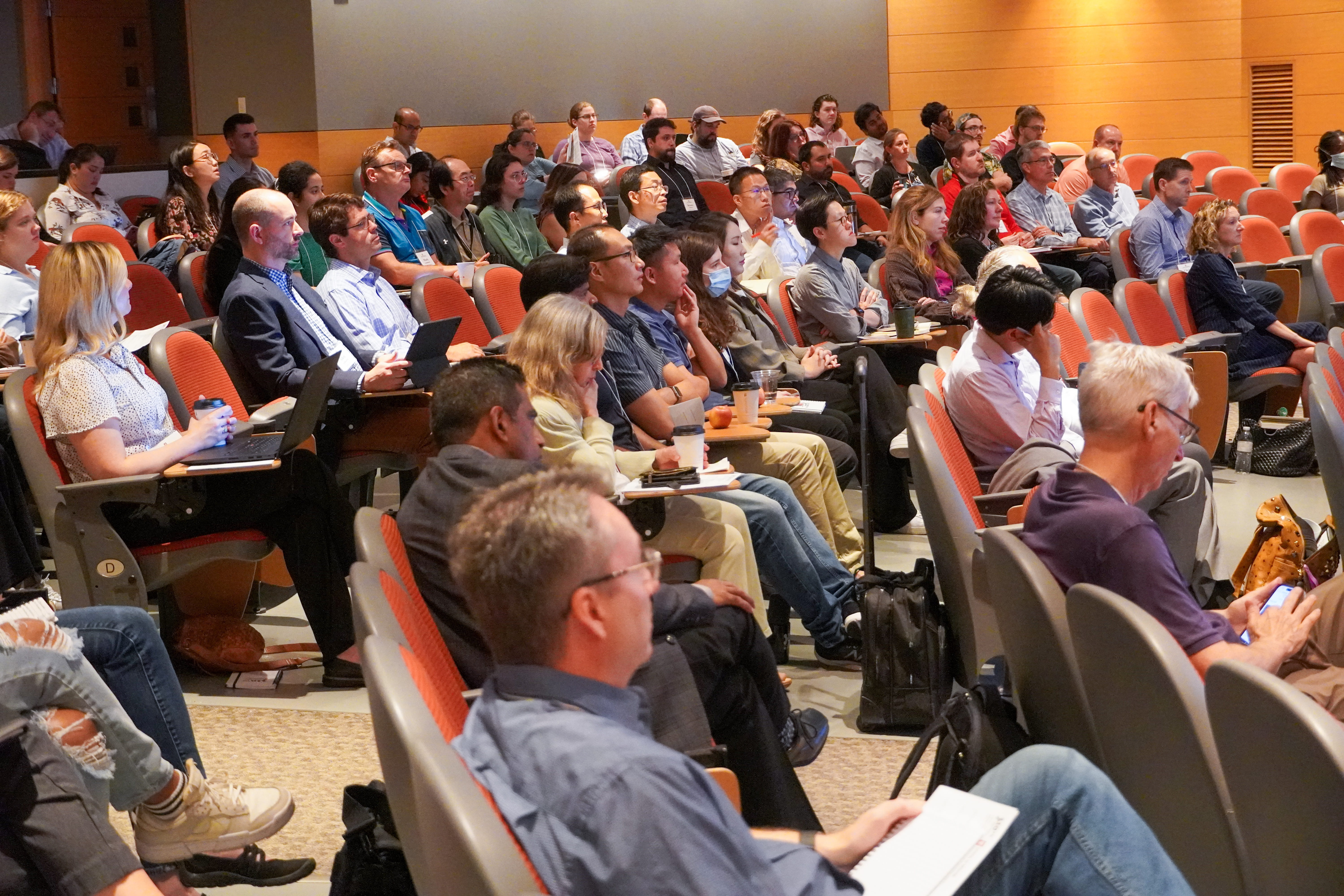 Crowd of attendees listening to a presentation at the 2024 CDMD Sympsoium.