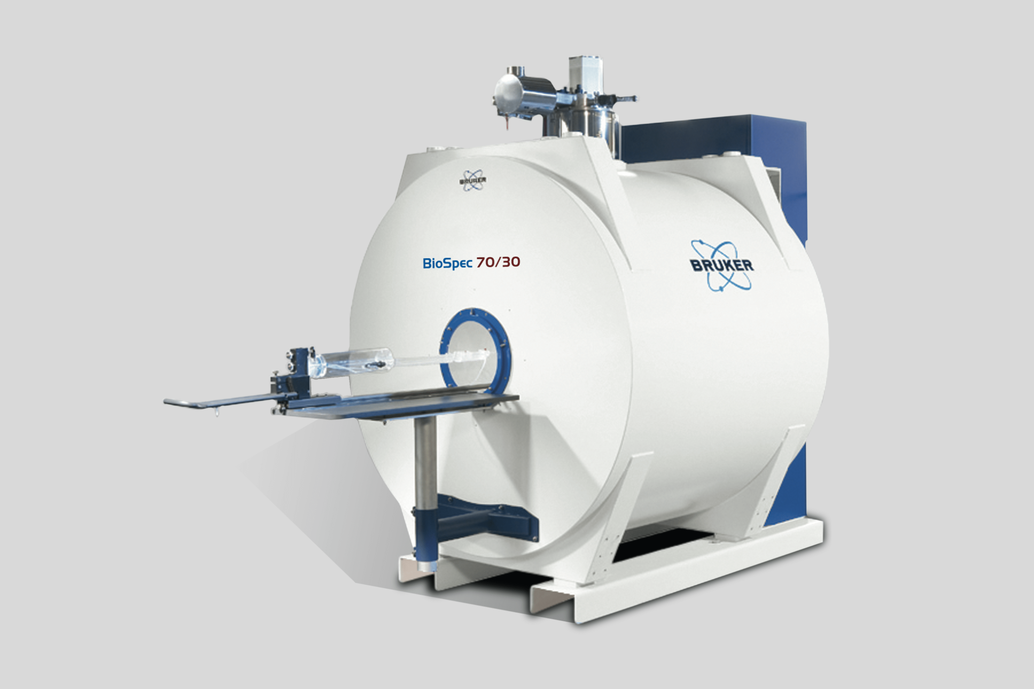 Vector image of the Bruker BioSpec 94/30 MR Scanner with gradient inserts, 1H MRI CryoProbeTM, and PET Insert Si 20/12 on a gray background.