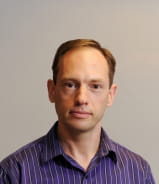 a headshot of Alexei Kuznetsov