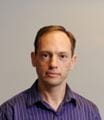 a headshot of Alexei Kuznetsov