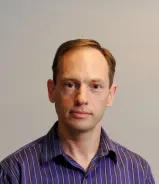 a headshot of Alexei Kuznetsov