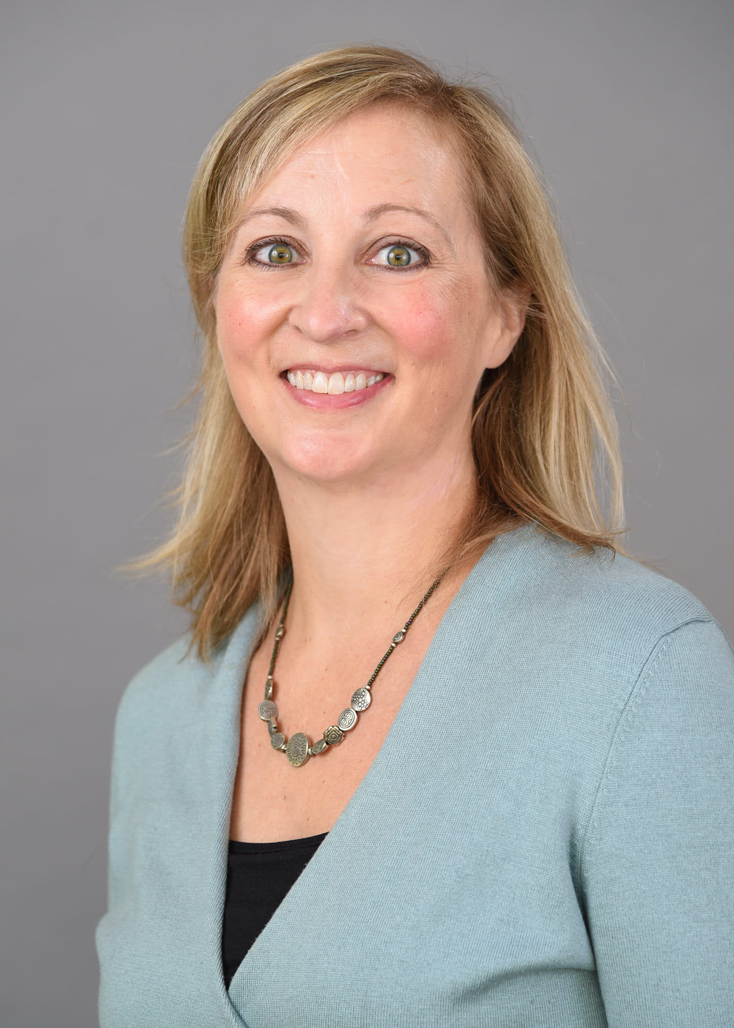 a headshot of Rene Baugh