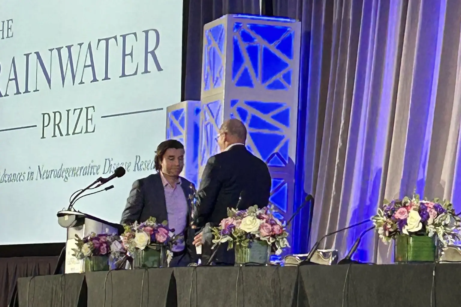 Cristian Lasagna-Reeves receiving an award