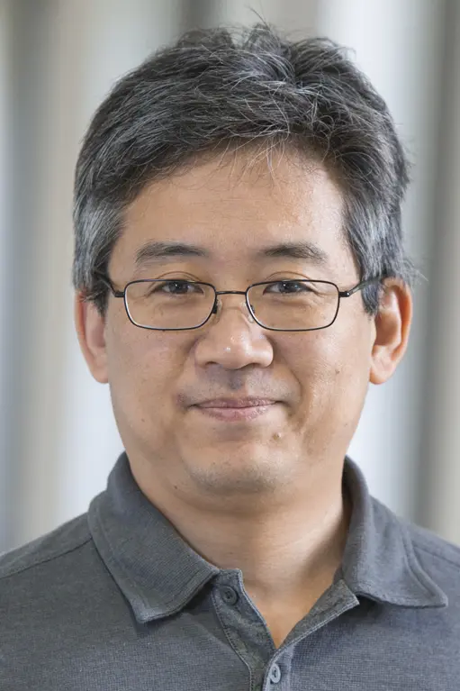 headshot of Kenichi Yoshida
