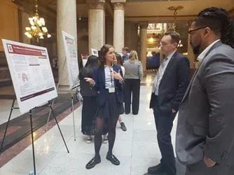 A student presents her research