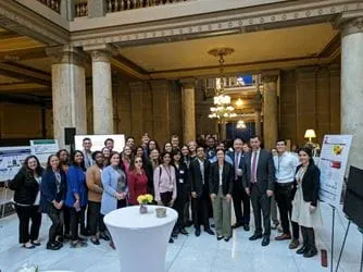 group photo of scientists and lawmakers