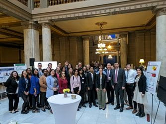 group photo of scientists and lawmakers