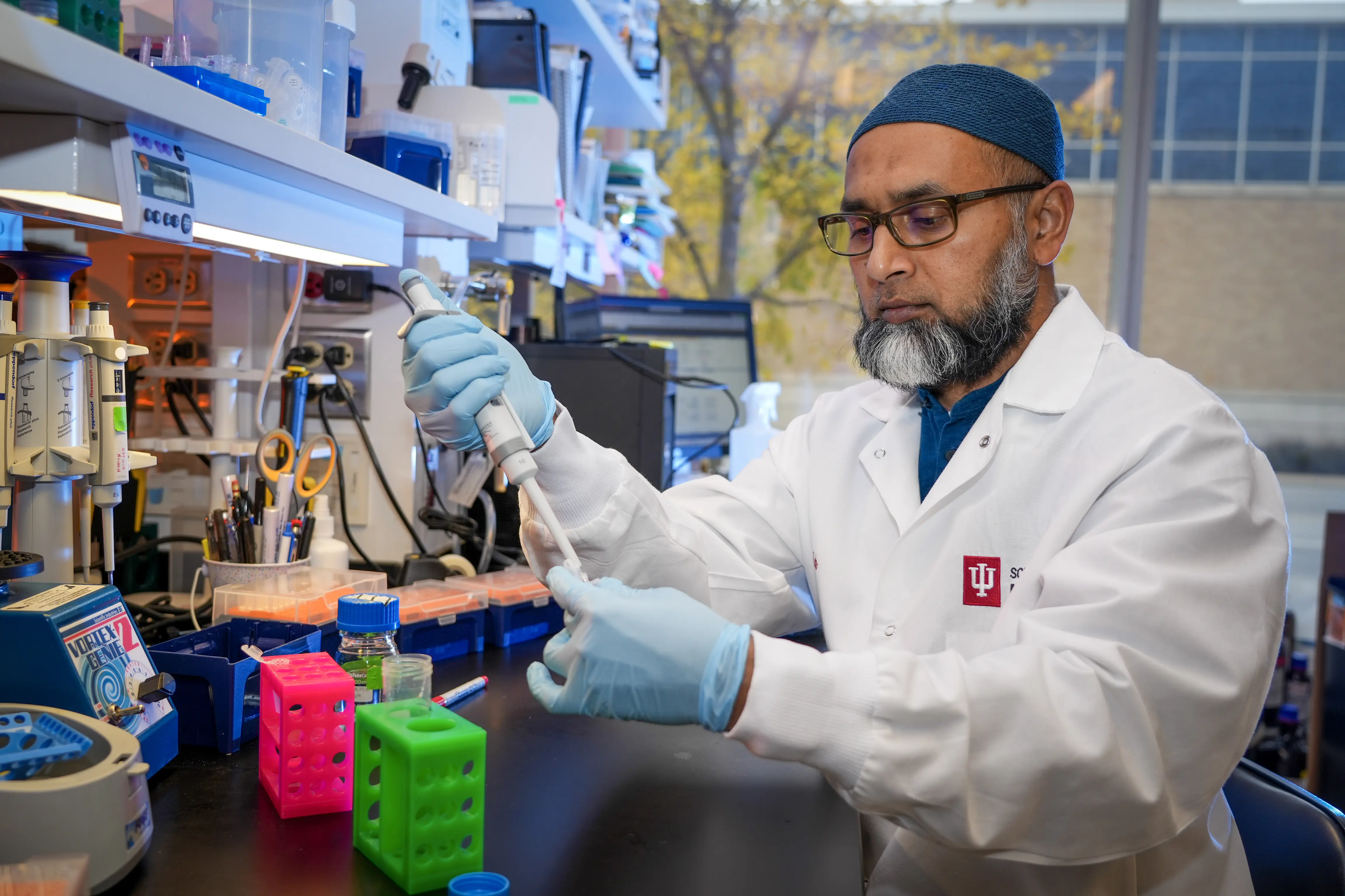a researcher uses a pipette