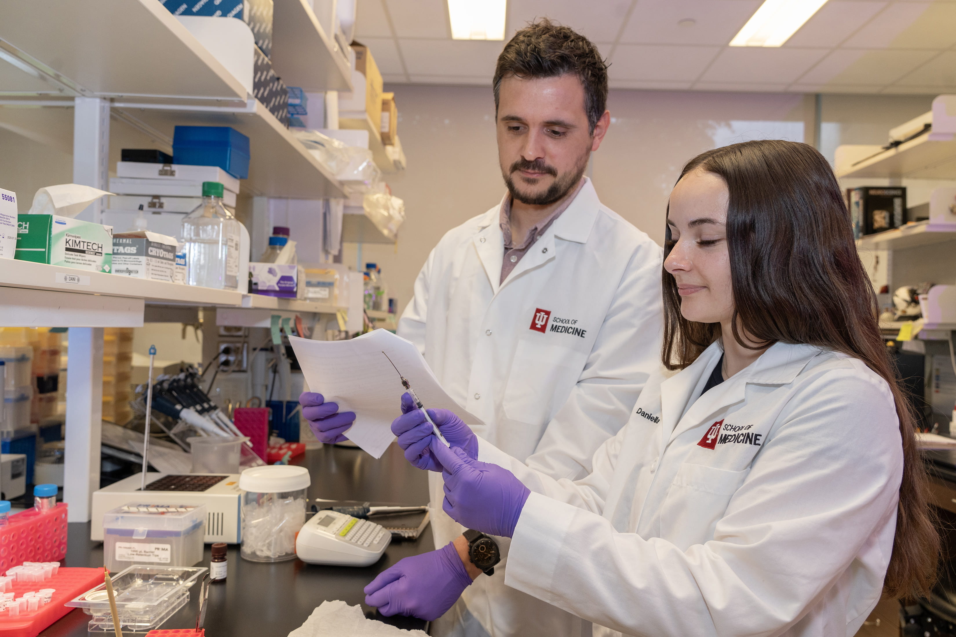 two researchers working in a lab