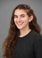 a headshot of Priya Shields