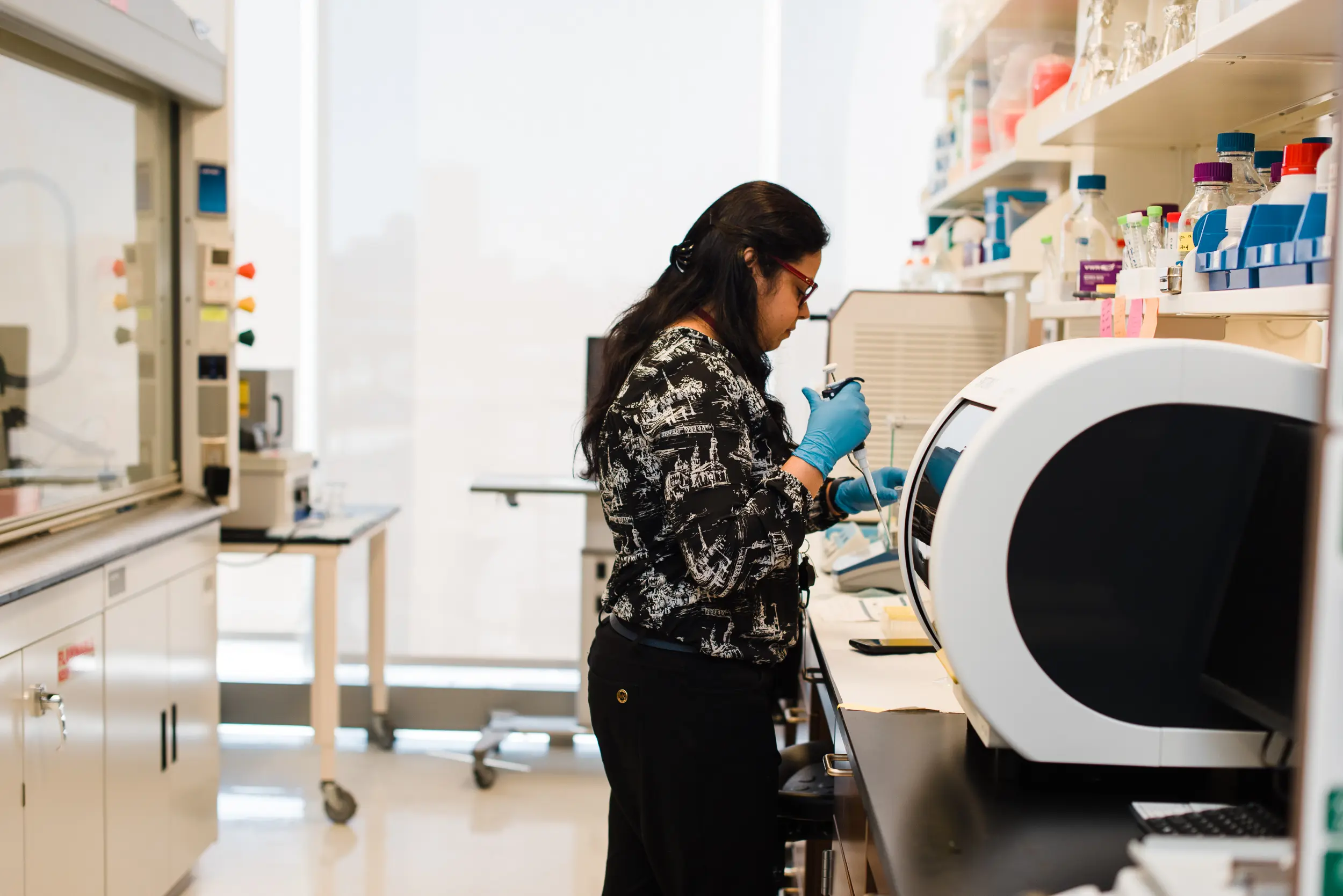 a researcher works in a lab
