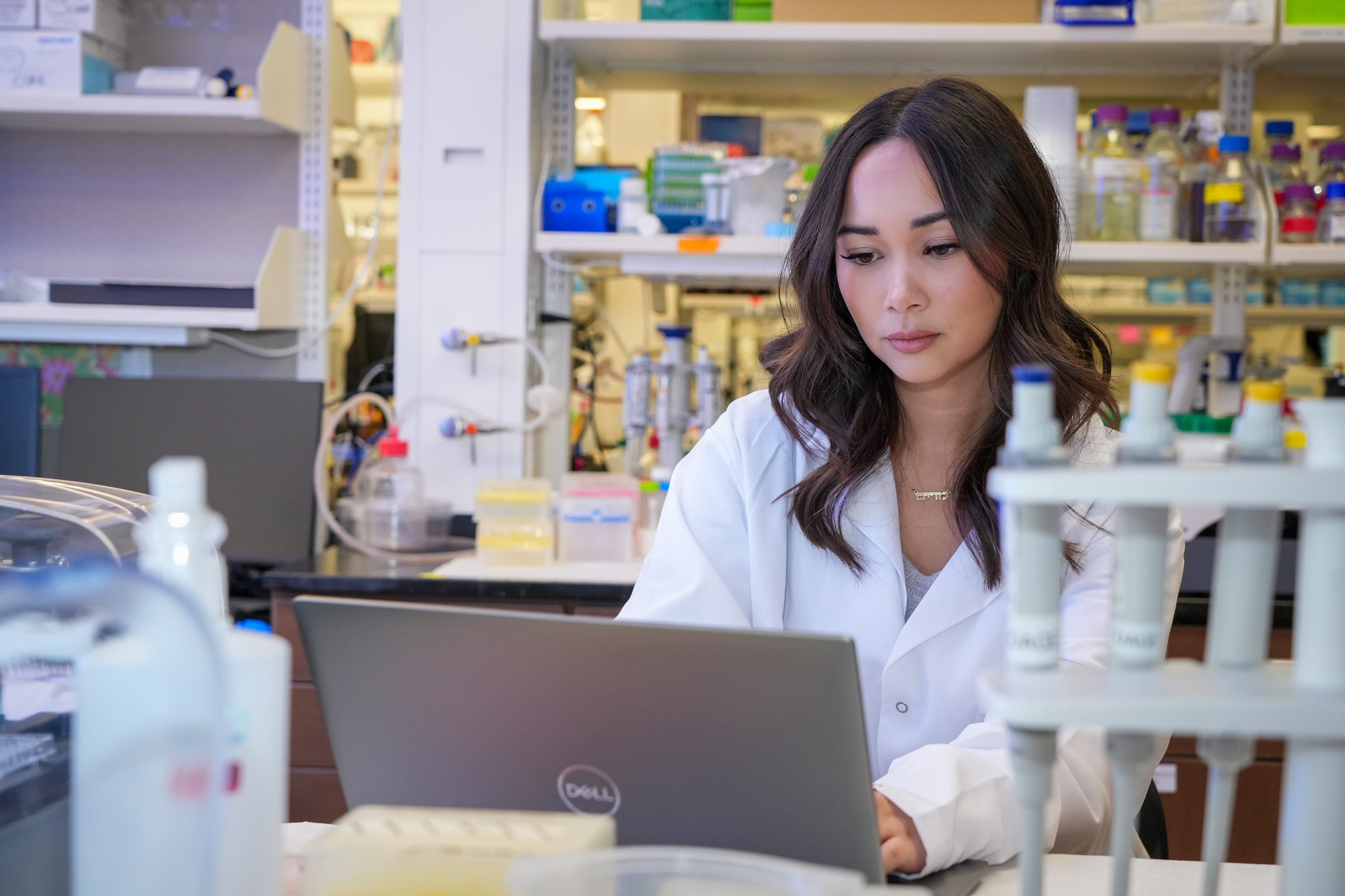 a lab member works on her computer