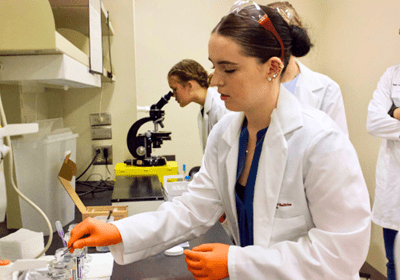Leiah Goodin working in a lab