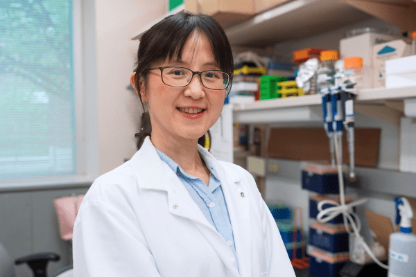 Headshot of Kate Ho in the lab